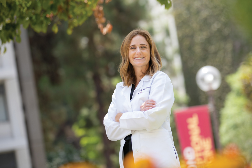 Keck Hospital nurse practitioner Emily Rorden stands with arms crossed