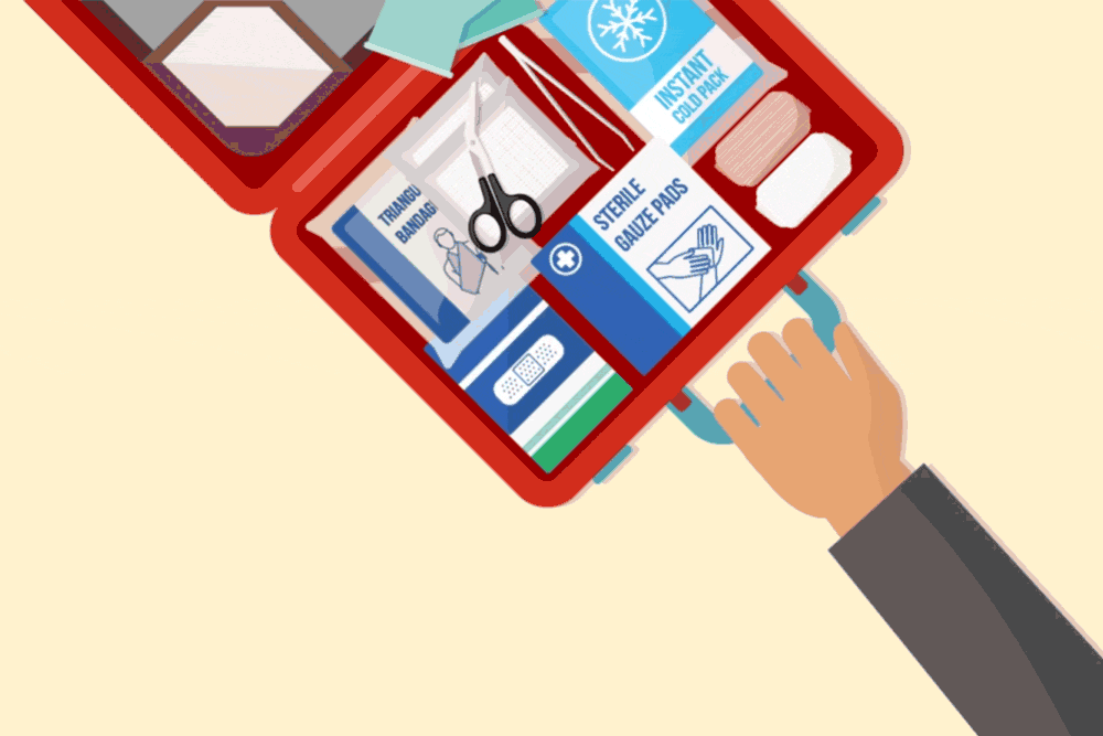 Image of a hand on a first aid kit