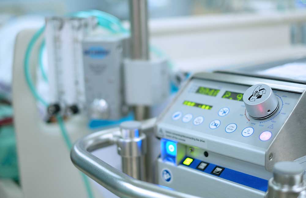 Knobs, buttons and digital display on an extracorporeal membrane oxygenation (ECMO) machine